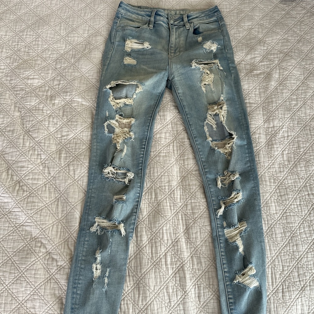 american eagle distressed ripped light wash super stretch x skinny jeans